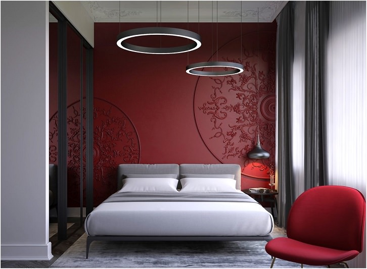 دکوراسیون اتاق خواب که دیوار تاکیدی قرمز پشت تخت خواب کار شده است