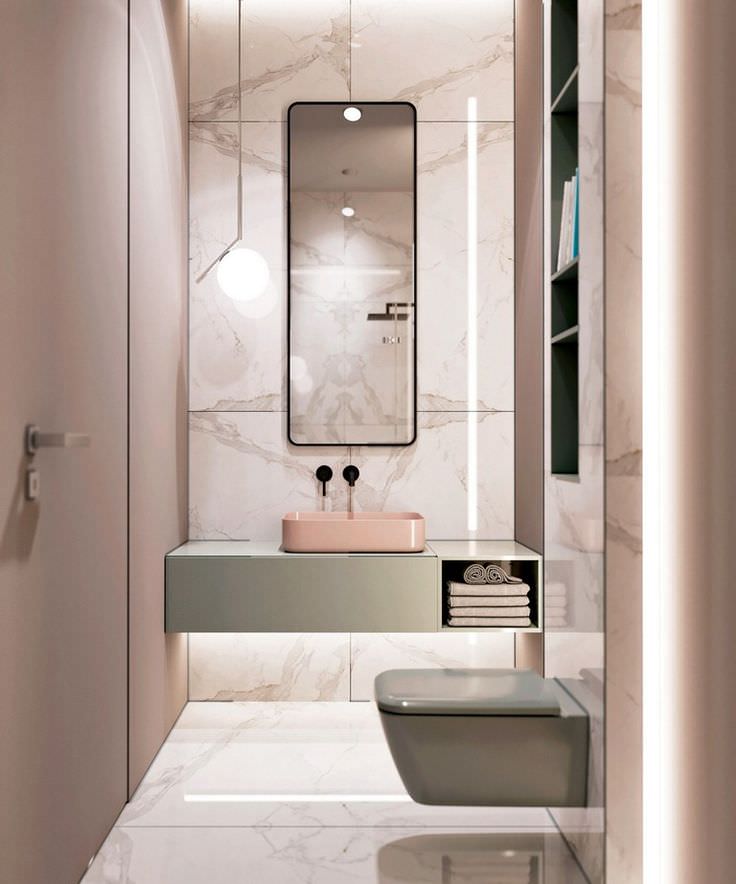 طراحی سرویس بهداشتی مدرن کوچک با توالت فرنگی وال هنگ و پالت رنگی صورتی و سبز